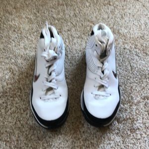 Nike high top basketball shoes.